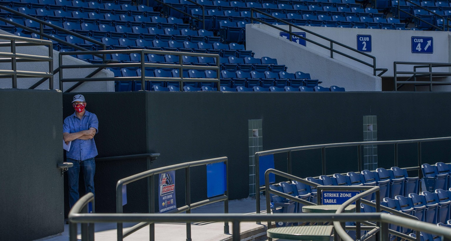 July 27, 2020, Rancho Cucamonga, California, USA: Columnist David Allen with his trademark St. Louis Cardinals face mask looks over an empty LoanMart Field as Major League Baseball has resumed as Mino ...