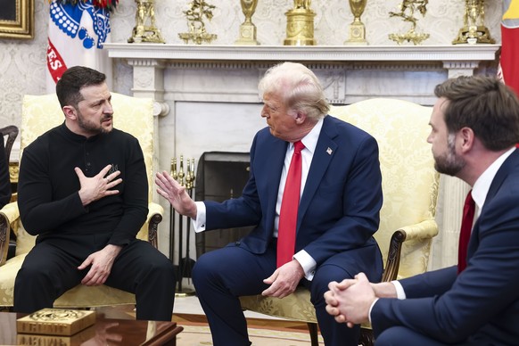 epaselect epa11930794 Ukrainian President Volodymyr Zelensky (L) talks with US President Donald Trump (C) and US Vice President JD Vance (R) in the Oval Office of the White House in Washington, DC, US ...