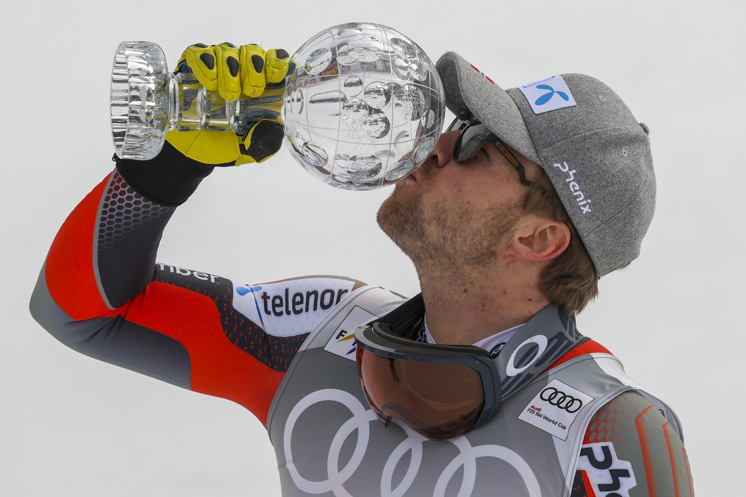 Norway&#039;s Aleksander Aamodt Kilde kisses the downhill overall leader&#039;s cup in the finish area of an alpine ski, men&#039;s World Cup Finals downhill, in Courchevel, France, Wednesday, March 1 ...