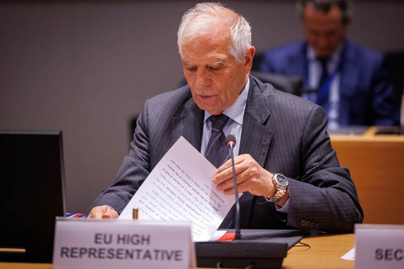 epa11373853 High Representative of the European Union for Foreign Affairs and Security Policy, Josep Borrell, checks his files prior to officially opening the next session of the 8th Brussels Conferen ...