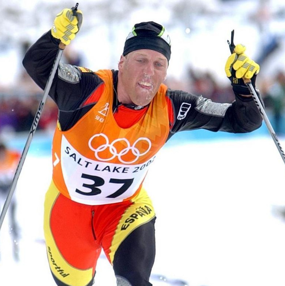 BIA07 - 20020223 - SOLDIER HOLLOW, UTAH, UNITED STATES : Johann Muehlegg of Spain drives over the finish line during the Men's 50km Classical Cross Country ski race at the XIX Winter Olympic Game ...