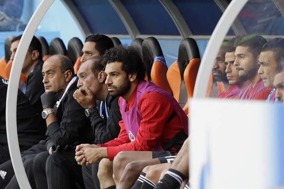 Egypt&#039;s Mohamed Salah, center, watches his team during the group A match between Egypt and Uruguay at the 2018 soccer World Cup in the Yekaterinburg Arena in Yekaterinburg, Russia, Friday, June 1 ...