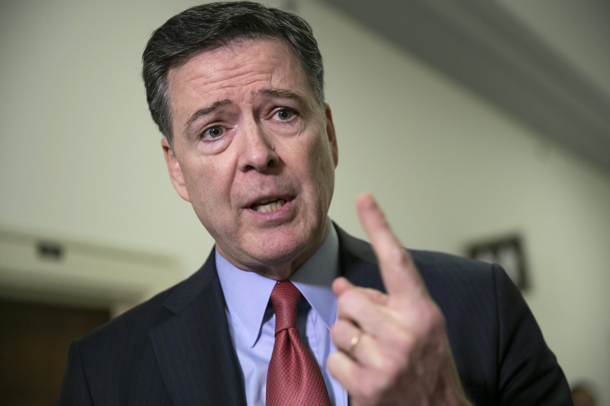 FILE - Former FBI Director James Comey speaks to reporters on Capitol Hill Washington, Dec. 17, 2018. (AP Photo/J. Scott Applewhite, File)
James Comey