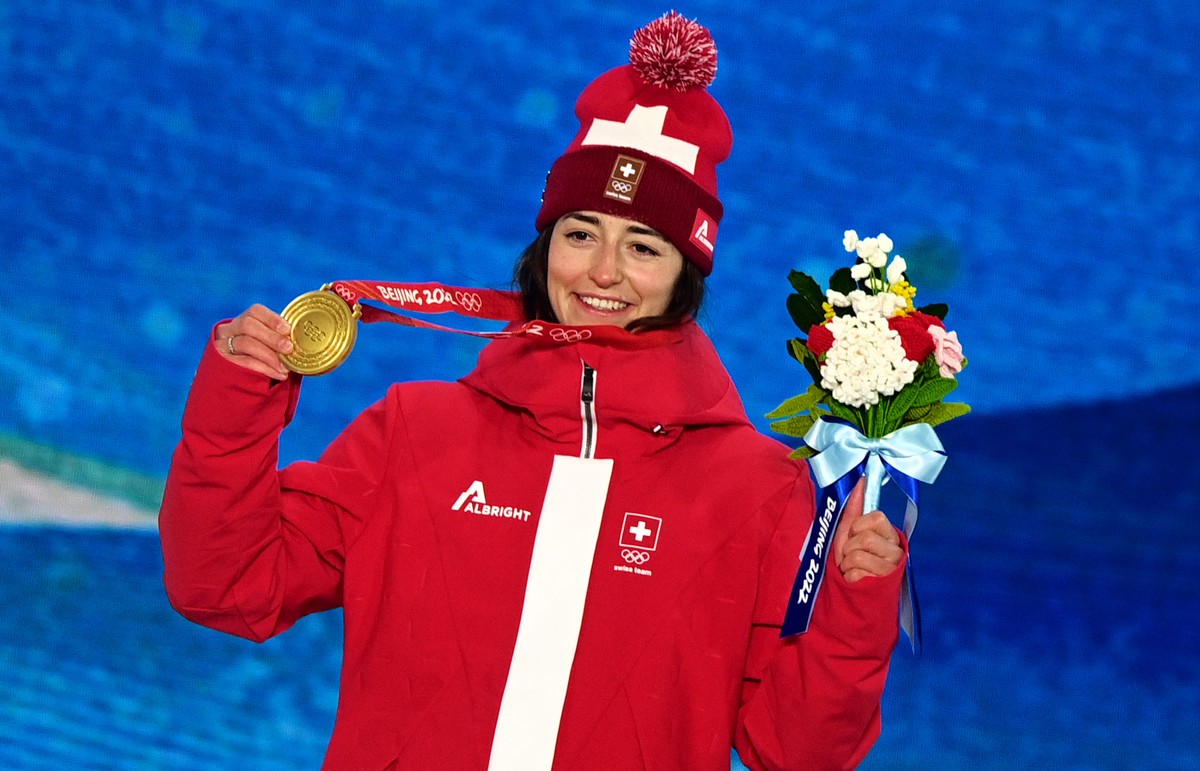 epa09759014 Gold medalist Mathilde Gremaud of Switzerland during the medal ceremony for the Women's Freestyle Skiing Slopestyle final at the Beijing 2022 Olympic Games, Beijing municipality, Chin ...