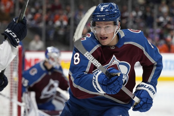 Colorado Avalanche defenseman Cale Makar pursues the puck in the second period of an NHL hockey game against the Florida Panthers Sunday, Dec. 12, 2021, in Denver. (AP Photo/David Zalubowski)