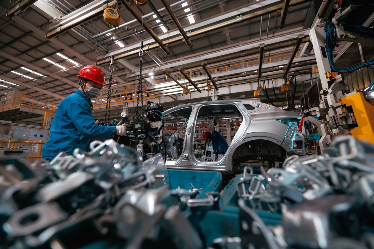 epa10974397 People work in BYD electric cars factory in Changzhou, Jiangsu Province, China, 14 November 2023. According to published data, the output of BYD Changzhou base from January to July this ye ...