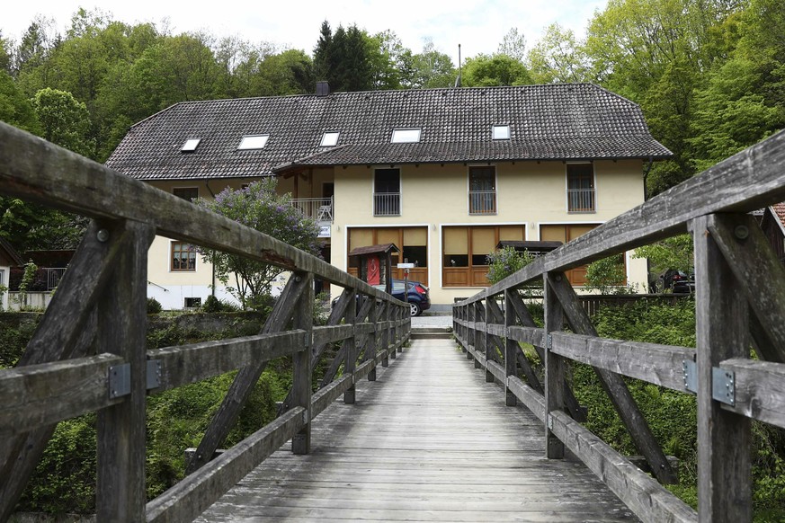 A guesthouse is pictured at the river &#039;Ilz&#039; in Passau, Germany, Monday, May 13, 2019. Police investigating the mysterious death of three people whose bodies were found with crossbow bolts in ...