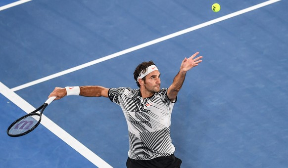 epa05721581 Roger Federer of Switzerland in action against Juergen Melzer of Austria during their Men&#039;s Singles first round match of the Australian Open Grand Slam tennis tournament in Melbourne, ...