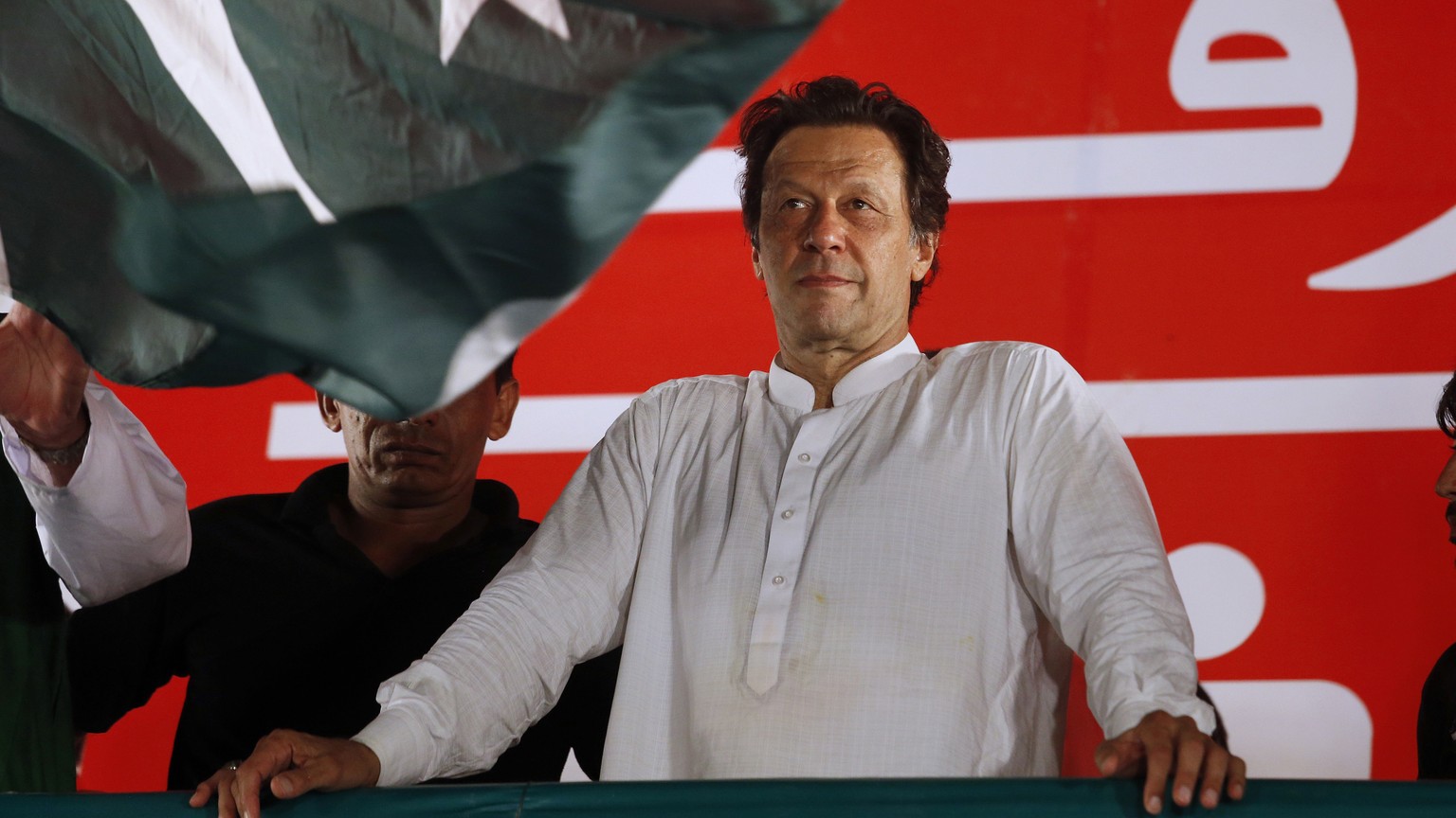 FILE - Pakistani politician Imran Khan, chief of Pakistan Tehreek-e-Insaf party, arrives to address an election campaign rally July 21, 2018, in Islamabad, Pakistan. Pakistan is holding elections for  ...
