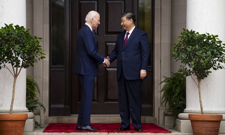 President Joe Biden greets China&#039;s President President Xi Jinping at the Filoli Estate in Woodside, Calif., Wednesday, Nov, 15, 2023, on the sidelines of the Asia-Pacific Economic Cooperative con ...