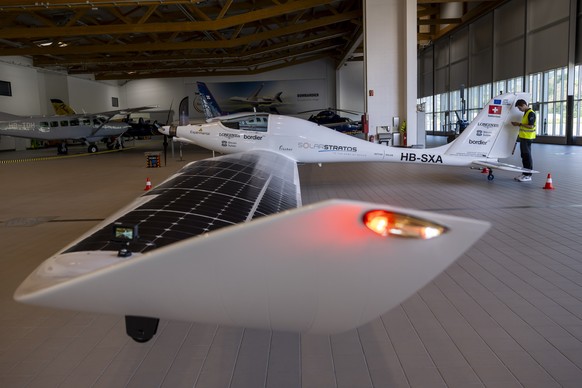 SolarStratos, a solar-powered aircraft prototype piloted by Swiss adventurer Raphael Domjan, is photographed in its hangar before flying over the Matterhorn during a reconnaissance and test flight nea ...