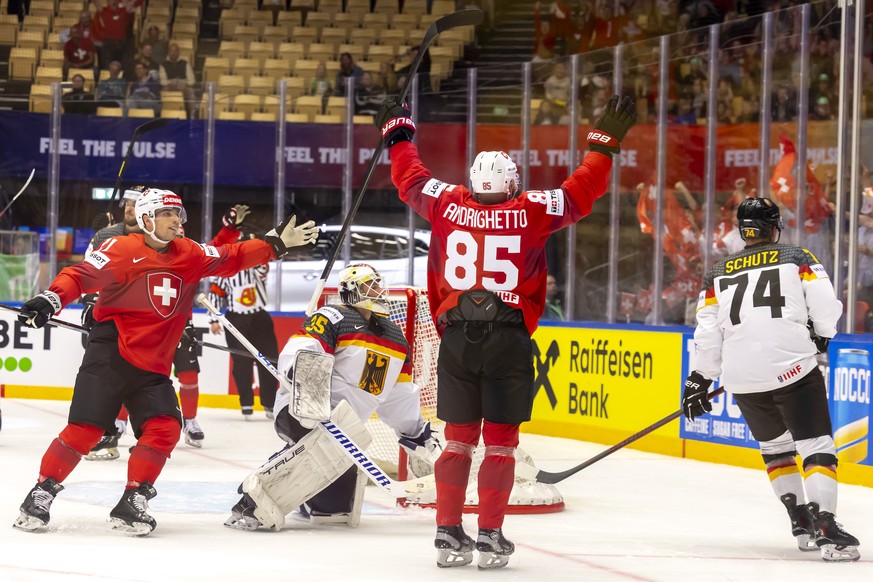 Switzerland&#039;s forward Sven Andrighetto #85 celebrates his goal with his teammate Switzerland&#039;s forward Kevin Fiala, left, after scoring the 3:0, during the IIHF 2025 World Championship preli ...
