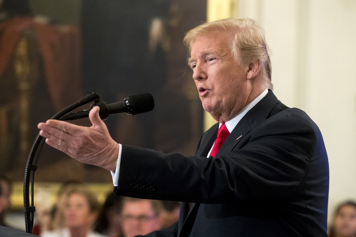 epa06898887 US President Donald J. Trump delivers remarks during an event entitled 'Pledge to America's Workers', in Washington, DC, USA, 19 July 2018. Trump signed an executive order e ...