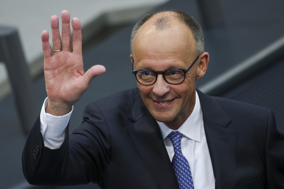 epa12076990 Designated German Chancellor Friedrich Merz attends the election of German Chancellor at the Bundestag in Berlin, Germany, 06 May 2025. The new German government will be formed between the ...