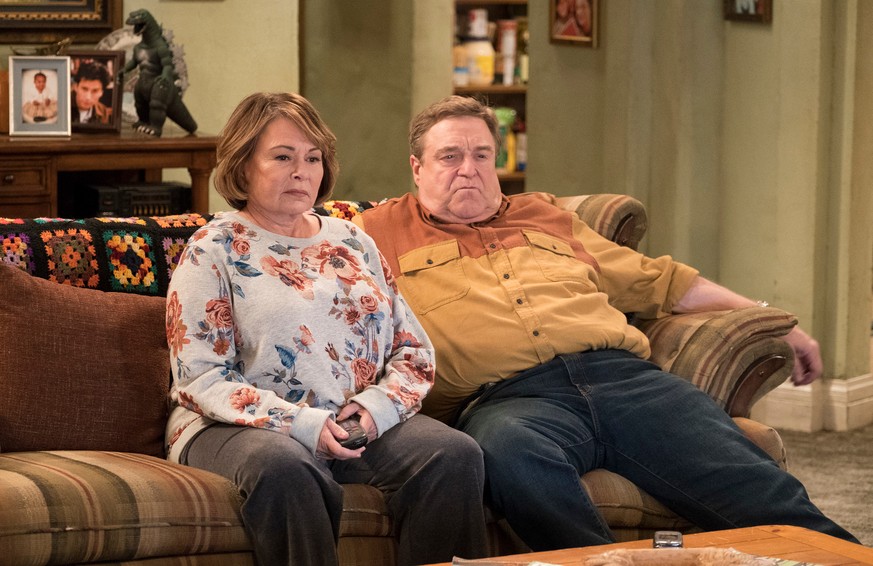 FILE - In this image released by ABC, Roseanne Barr, left, and John Goodman appear in a scene from the reboot of &quot;Roseanne.&quot; The Nielsen company said viewership for the show&#039;s premiere  ...