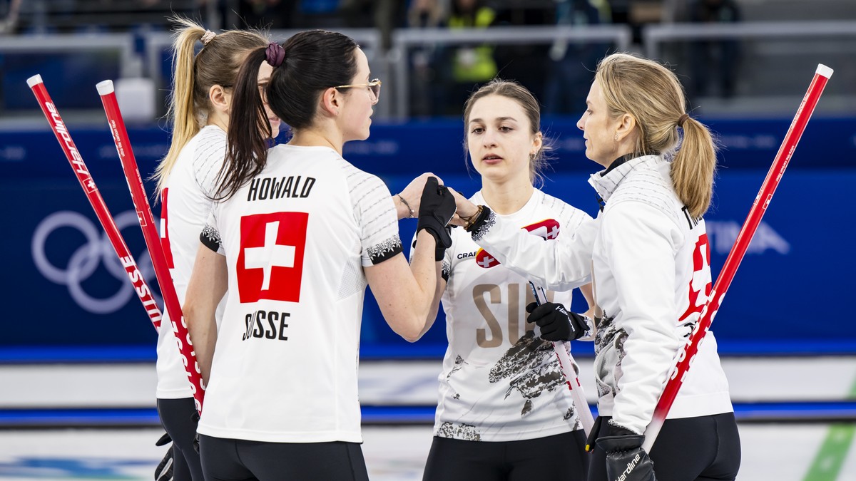 Alina Paetz, Carole Howald, Selina Witschonke and Silvana Tirinzoni of Switzerland, from left to right, react during the women's curling semi-final game between Switzerland and USA at the 2026 Ol ...
