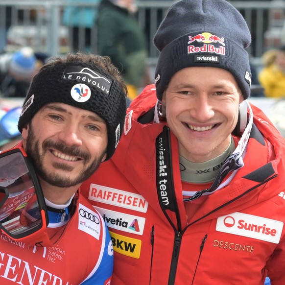 epa11089603 (L-R) Florian Schieder of Italy, Cyprien Sarrazin of France and Marco Odermatt of Switzerland pose in the finish area during the Men&#039;s Downhill race at the FIS Alpine Skiing World Cup ...