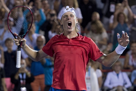 Denis Shapovalov, of Canada, celebrates after defeating Adrian Mannarino, of France, during quarterfinal play at the Rogers Cup tennis tournament Friday, Aug.11, 2017, in Montreal. (Paul Chiasson/The  ...