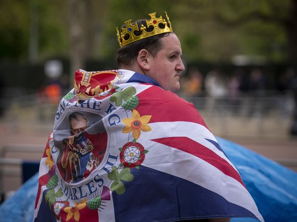 Royal devotee Patrick O'Neil stands along the King's Coronation route at The Mall in London, Tuesday 2nd May 2023. The coronation of King Charles III will take place at Westminster Abbey...