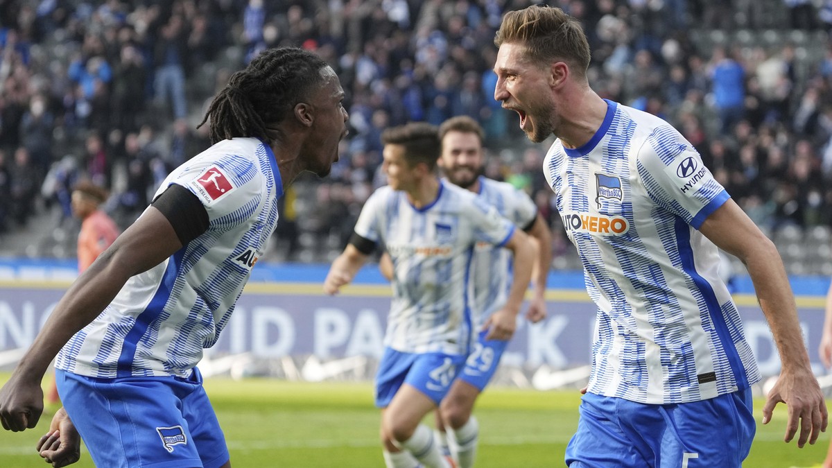 Hertha's Niklas Stark, right, celebrates scoring with teammate Dedryck Boyata during the Bundesliga soccer match between Hertha BSC and TSG 1899 Hoffenheim at Olympiastadion, Berlin, Saturday Mar ...