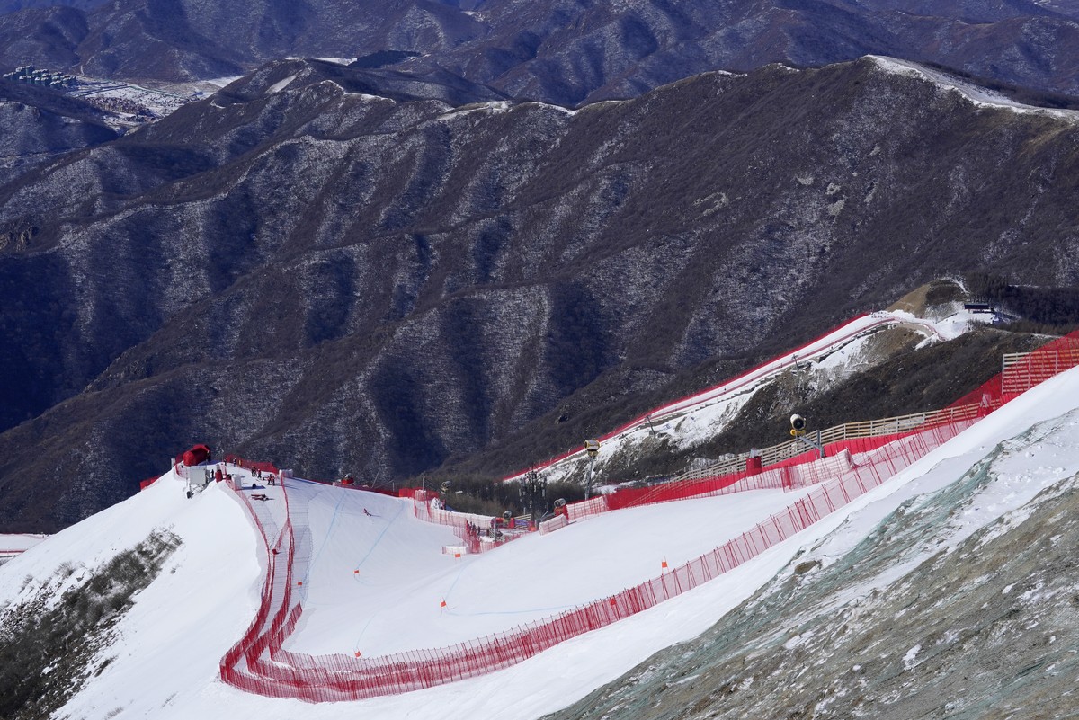 A forerunner tests the alpine skiing downhill course at the 2022 Winter Olympics, Wednesday, Feb. 2, 2022, in the Yanqing district of Beijing. (AP Photo/Robert F. Bukaty)