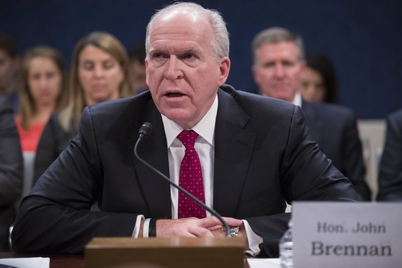 epa05984069 Former CIA Director John Brennan testifies before the House Intelligence Committee hearing on the investigation about Russian interference in the 2016 presidential campaign on Capitol Hill ...