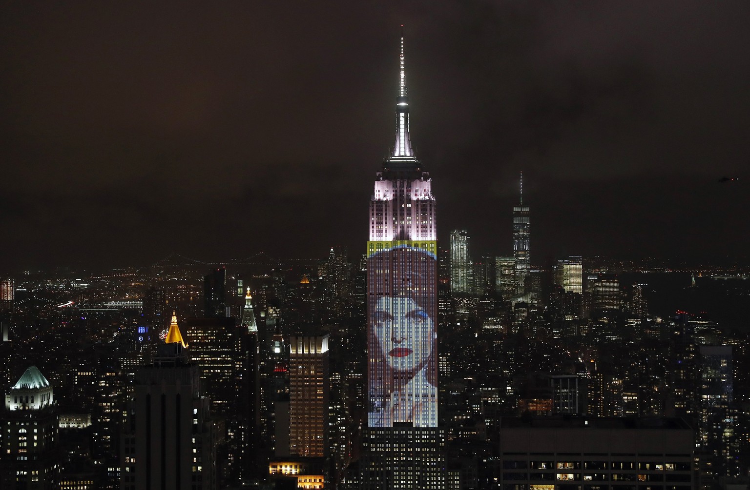 epa05916178 US model Stephanie Seymour&#039;s photograph is projected onto the Empire State Building&#039;s north facade to celebrate the 150th anniversary of Harper&#039;s Bazaar Magazine in New York ...