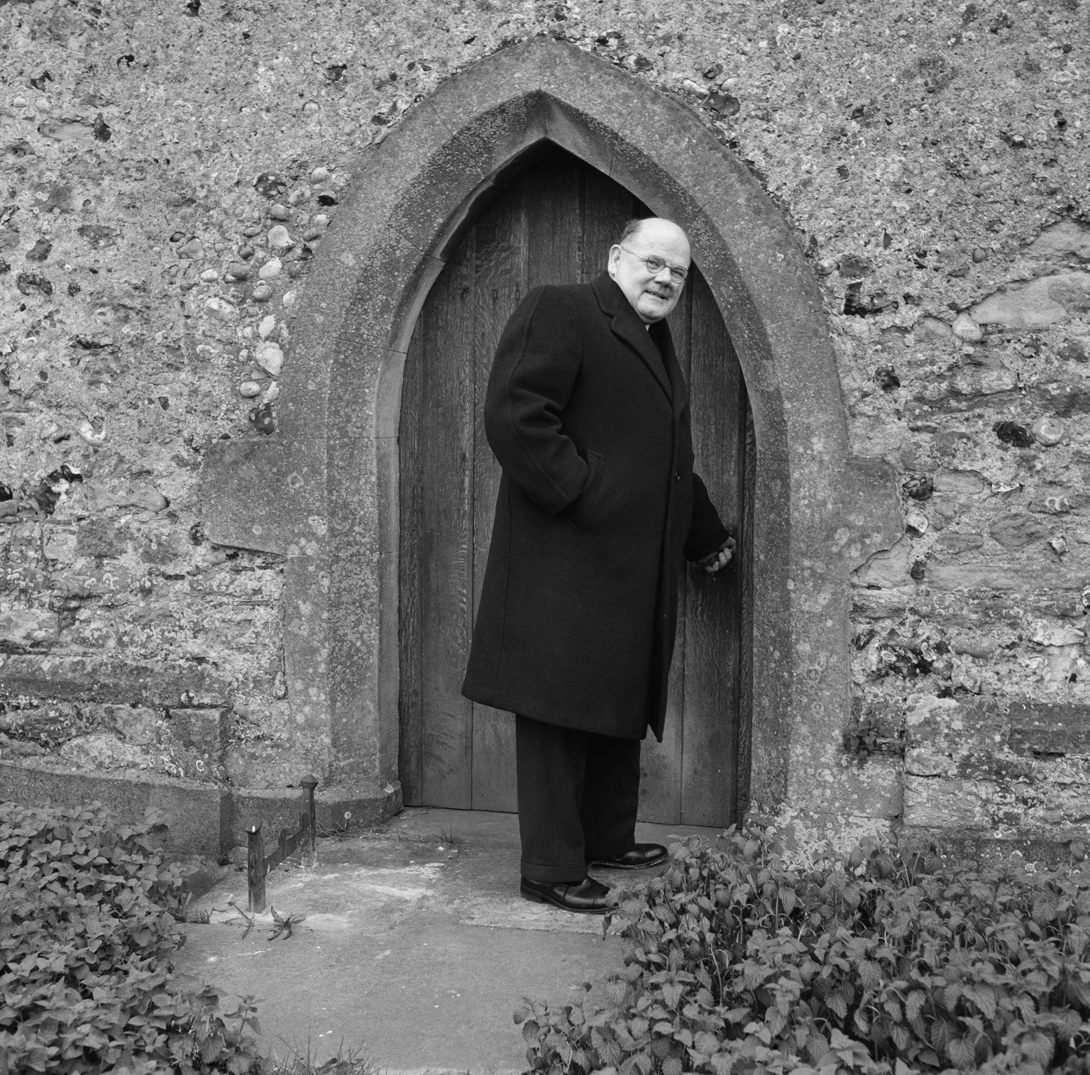 General Practitioner Dr John Bodkin Adams standing outside a church door, April 15th 1957. Adams was acquitted of murder a week previously but convicted of fraud. (Photo by Daily Express/Hulton Archiv ...