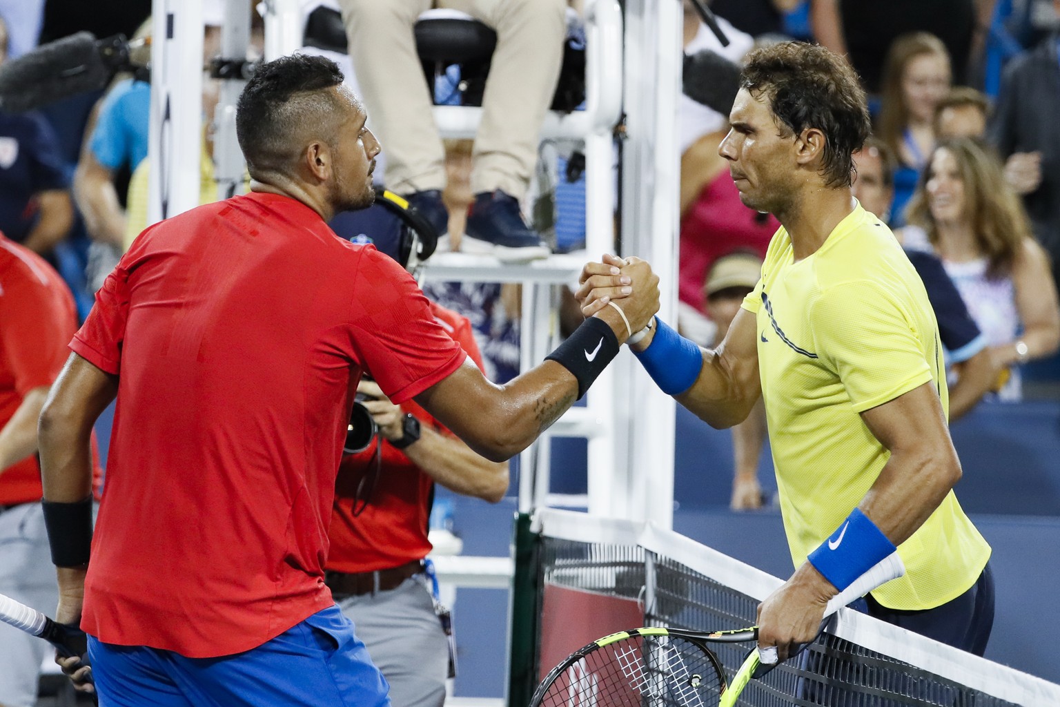 Nick Kyrgios, of Australia, shakes hands with Rafael Nadal, of Spain, after Kyrgios won their match at the Western &amp; Southern Open tennis tournament, Friday, Aug. 18, 2017, in Mason, Ohio. Kyrgios ...