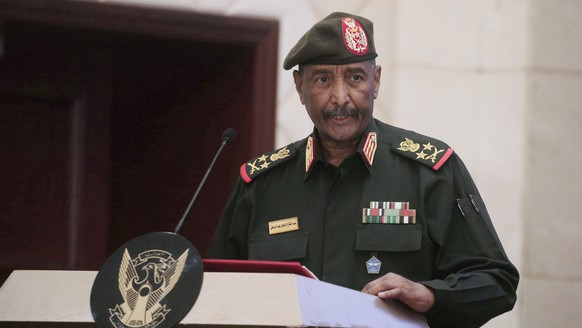 FILE - Sudan&#039;s Army chief Gen. Abdel-Fattah Burhan speaks following the signature of an initial deal aimed at ending a deep crisis caused by last year&#039;s military coup, in Khartoum, Sudan, De ...