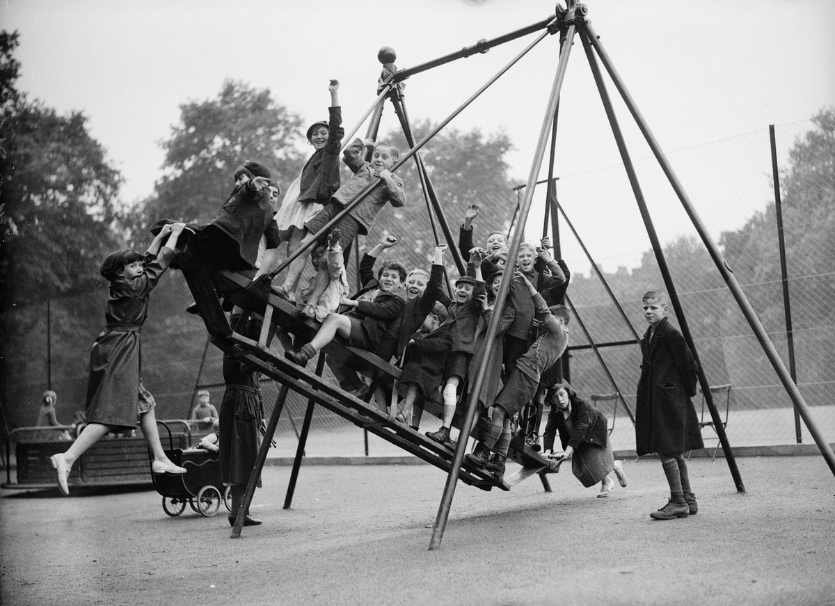 1st August 1936: London children have fun on the swings at the new playground on the site of the Old Foundling Hospital in Bloomsbury. (Photo by William Vanderson/Fox Photos/Getty Images)
