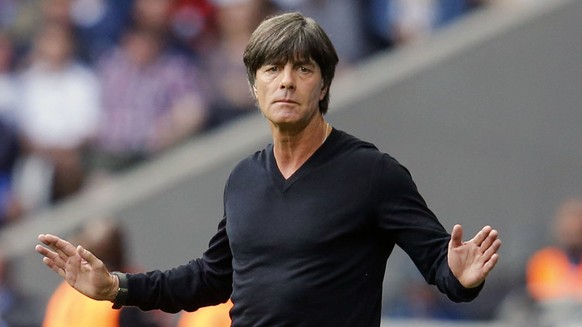 FILE - In this Sunday, June 26, 2016 file photo, Germany coach Joachim Loew gestures during the Euro 2016 round of 16 soccer match between Germany and Slovakia, at the Pierre Mauroy stadium in Villene ...