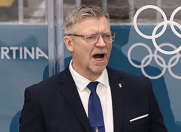 epa12734767 Italian national team head coach Jukka Jalonen reacts during the Men's Ice Hockey preliminary round match between Italy and Slovakia at the Milano Cortina 2026 Winter Olympic Games, i ...