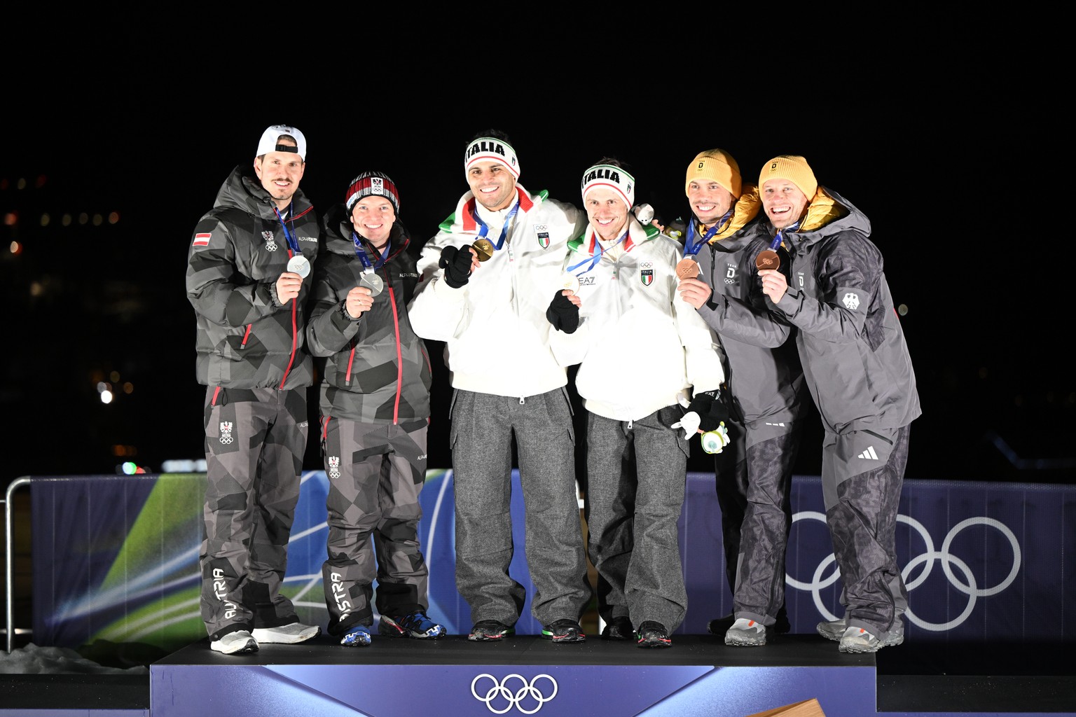 epa12728677 (L-R) Silver medal winners Thomas Steu and Wolfgang Kindl of Austria, gold medal winners Emanuel Rieder and Simon Kainzwaldner of Italy and bronze medal winners Tobias Wendl and Tobias Arl ...