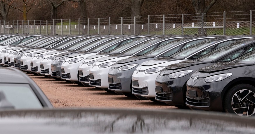 FILE - In this Tuesday, Feb. 25, 2020 file photo, Electric car ID.3 cars stand at the factory area during a press tour at the plant of the German manufacturer Volkswagen AG ,VW, in Zwickau, Germany. A ...