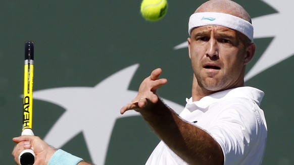 ARCHIVBILD ZU NEUEM FEDERER COACH LJUBICIC --- Ivan Ljubicic, of Croatia, returns a shot to Novak Djokovic, of Serbia, during their match at the BNP Paribas Open tennis tournament in Indian Wells, Cal ...