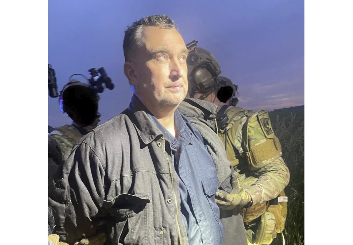 This photo made available by the Ramsey County Sheriff's Office shows Vance Luther Boelter, the man accused of assassinating the top Democrat in the Minnesota House, as he was arrested late Sunda ...