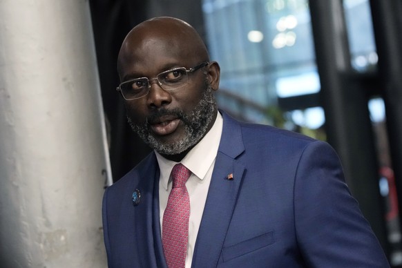 FILE - Liberia&#039;s President George Weah arrives to attend the Paris Peace Forum, in Paris, Nov. 11, 2021. Weah conceded defeat late Friday, Nov. 17, 2023, after provisional results from the week?s ...
