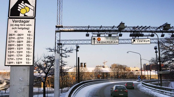 This photo taken Monday Jan. 2, 2006 shows the ramps of cameras and sensors that will monitor in and out-going traffic at the western entry to Stockholm City when the congestion-tax trial will starts  ...