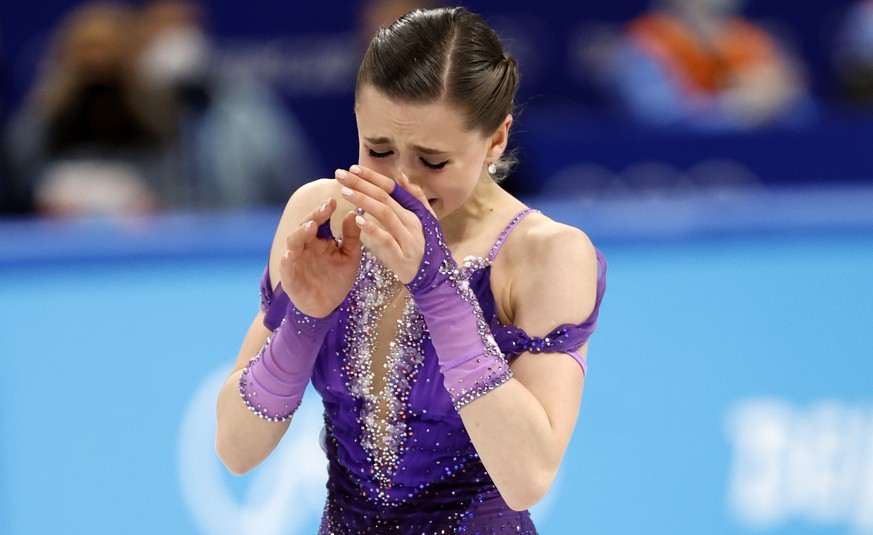 epa09759494 Kamila Valieva of Russia reacts before the Women&#039;s Short Program of the Figure Skating events at the Beijing 2022 Olympic Games, Beijing, China, 15 February 2022. EPA/HOW HWEE YOUNG