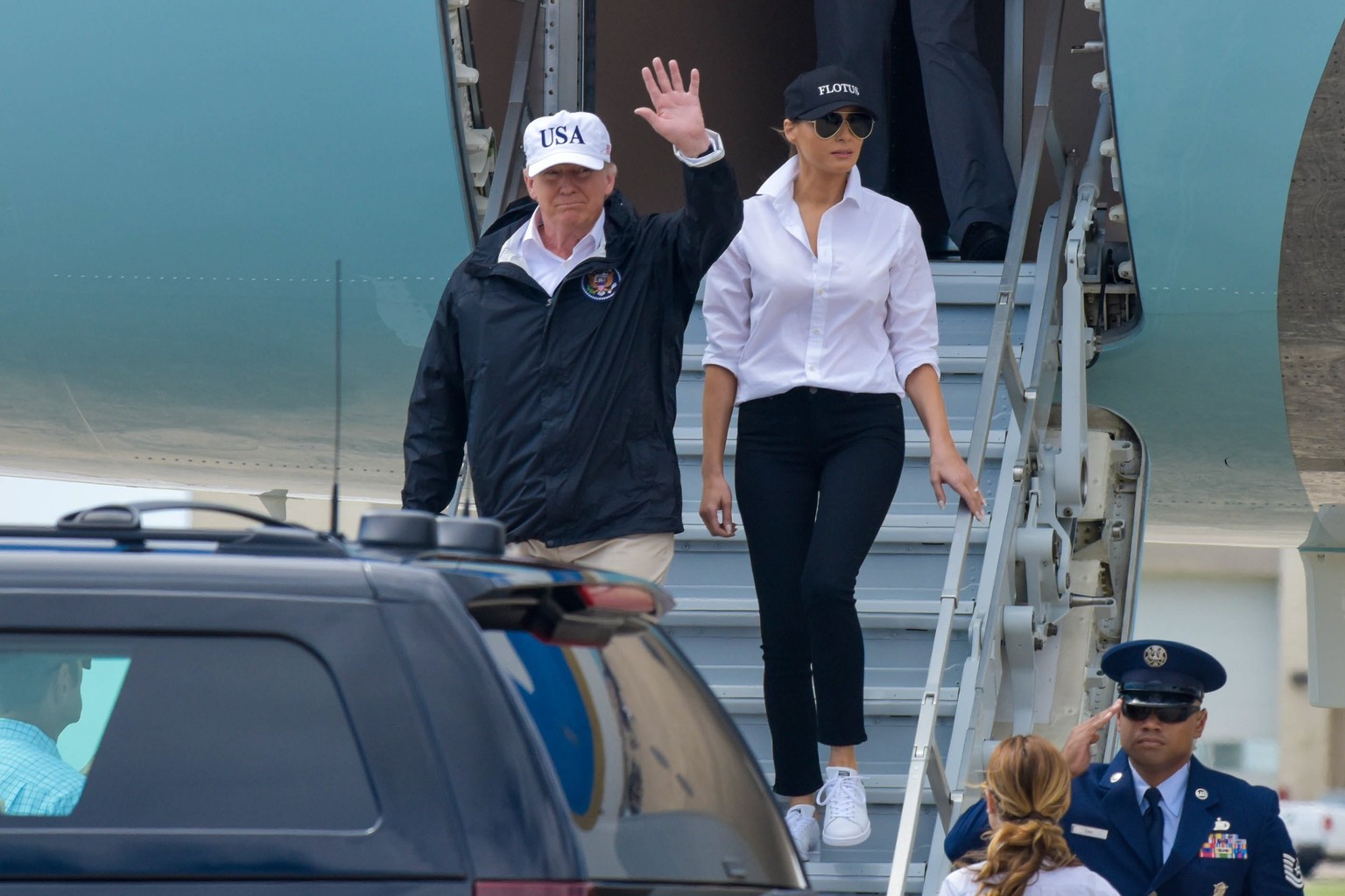 epa06170613 US President Donald J. Trump (L) and First Lady Melania Trump step off Air Force One after arriving in Corpus Christi, Texas, USA, 29 August 2017. Trump is getting an update on the relief  ...