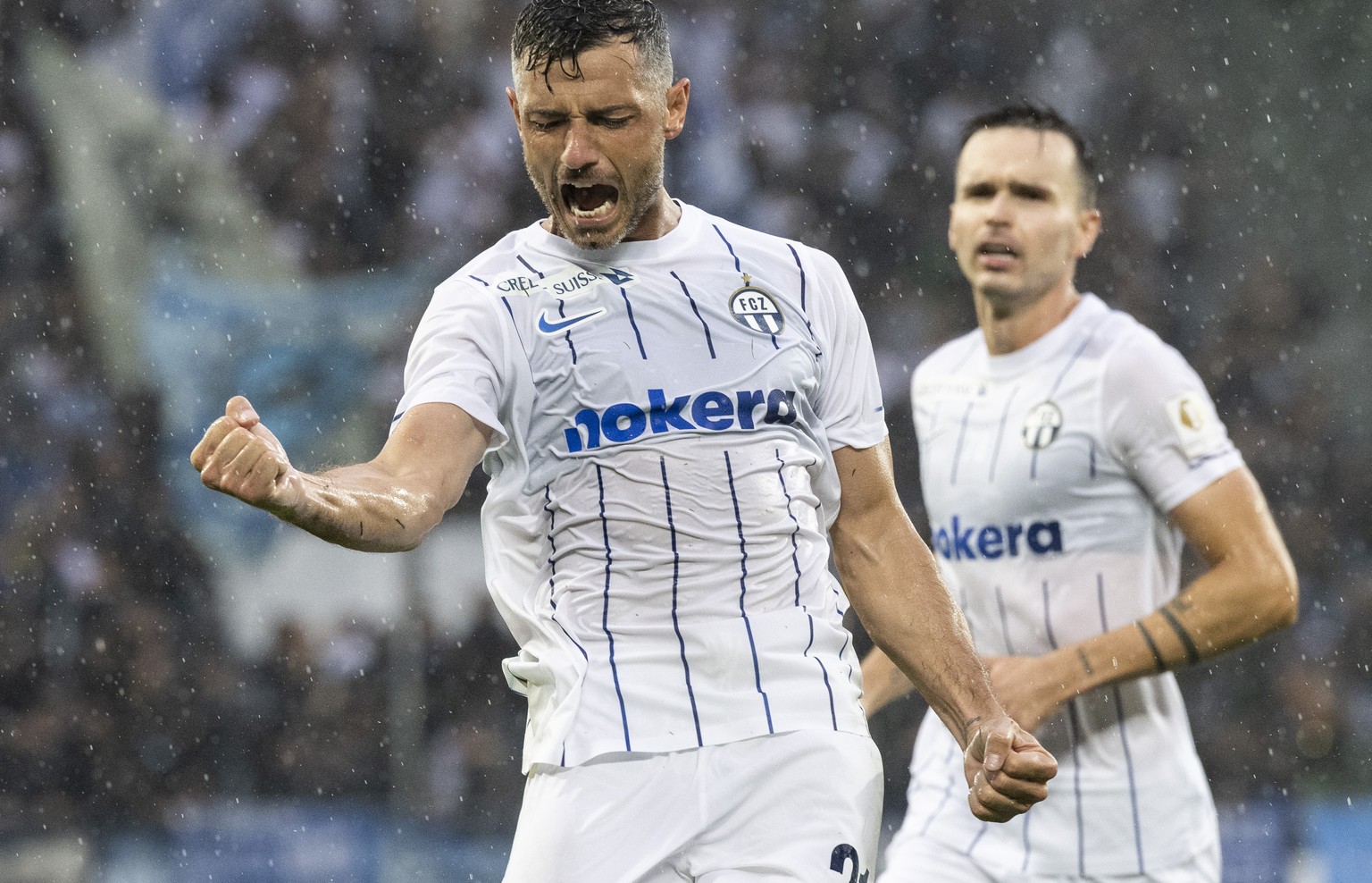 Zurich&#039;s Blerim Dzemaili, front celebrates after scoring his side&#039;s second goal during the Europa League qualification soccer match between FC Zurich and Heart of Midlothian FC at the Kybunp ...