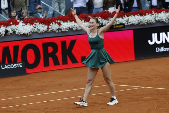 epa12928367 Marta Kostyuk of Ukraine celebrates after winning her women's singles finals matach against Mirra Andreeva of Russia at the Madrid Open tennis tournament in Madrid, Spain, 02 May 2026 ...