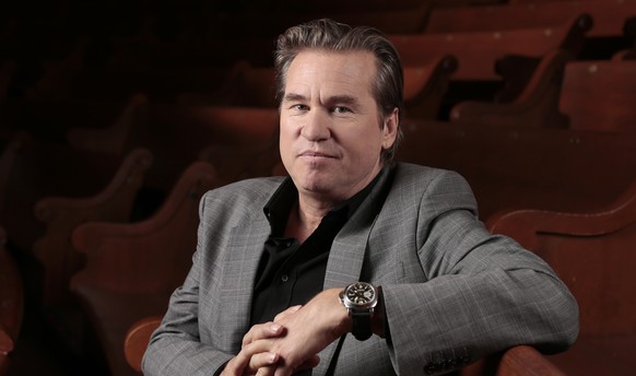 FILE - In this Jan. 9, 2014 file photo, Val Kilmer poses for a portrait in Nashville, Tenn. Kilmer wrote on Reddit April 26, 2017, that he’s had “a healing of cancer.” (AP Photo/Mark Humphrey, File)