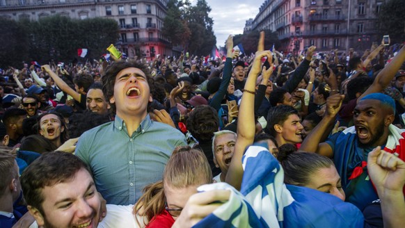 epa06879178 French fans at a public viewing in the Paris city hall square celebrate their team&#039;s victory in the FIFA 2018 World Cup semi final match between France and Belgium in Paris, France, 1 ...