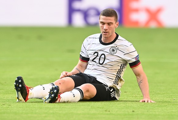 epa09286165 Robin Gosens of Germany reacts during the UEFA EURO 2020 group F preliminary round soccer match between Portugal and Germany in Munich, Germany, 19 June 2021. EPA/Christof Stache / POOL (R ...