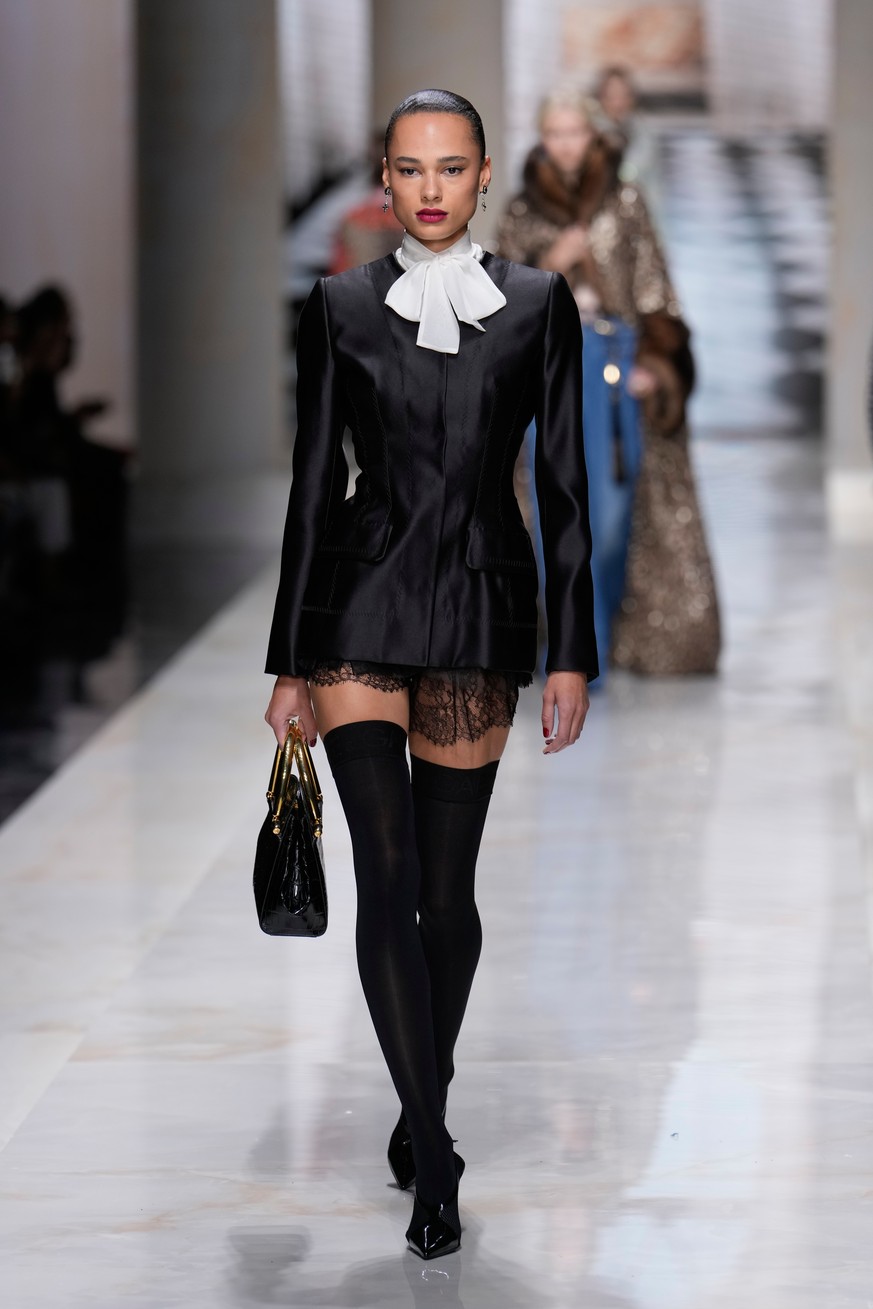 A model wears a creation part of Dolce &amp; Gabbana women's Spring-Summer 2027 collection, presented in Milan, Italy, Saturday, Sept. 26, 2026. (AP Photo/Luca Bruno)
Italy Fashion Dolce &amp; Ga ...