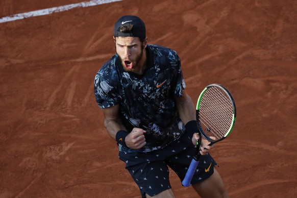 Russia&#039;s Karen Khachanov clenches his fist after scoring a point against Argentina&#039;s Juan Martin del Potro during their fourth round match of the French Open tennis tournament at the Roland  ...
