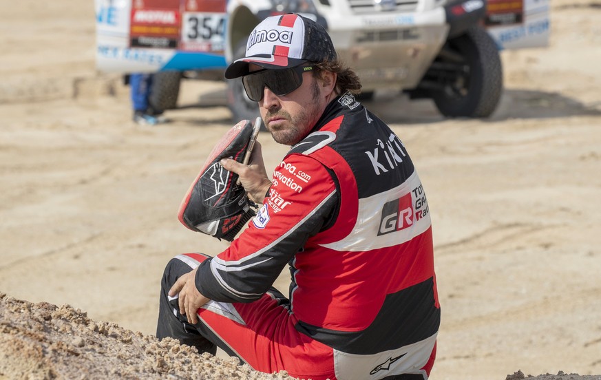 epa08129756 Spanish driver Fernando Alonso of the Toyota Gazoo Racing team reacts at the end of stage ten of the Rally Dakar 2020 between Haradh and Shubaytah, Saudi Arabia, 15 January 2020. The stage ...