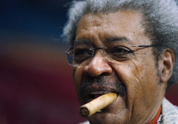Boxing promoter Don King chews on a cigar before bouts Saturday, Jan. 19, 2008, at Madison Square Garden in New York. (AP Photo/Julie Jacobson)
